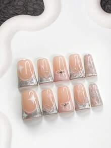 10件套温柔少女美甲套装，包含法式美甲贴片、杏仁形美甲贴片、方形美甲贴片、鸭嘴美甲贴片、手绘星星假指甲、蝴蝶结美甲配件、银色猫眼美甲胶、粉色指甲油，以及工具包（1片果冻美甲贴片+1把指甲锉），适合女性和女孩，可用于日常拍照和派对美甲。手工美甲贴片。 - 彩色 - 查看 11