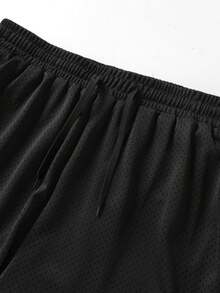 Bộ đồ thể thao nam dáng rộng thoải mái gồm áo ba lỗ và quần dài, thích hợp cho mùa hè. - màu đen - Xem 7