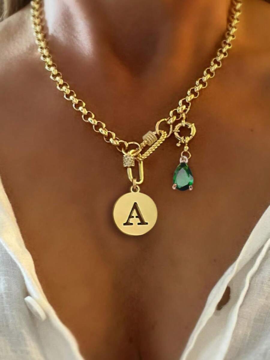 This STYLEVER Single Gold Letter Pendant Necklace, Paired With Green Gemstones And Stainless Steel Chain, Is Suitable For Wearing To Work, Daily Life, Parties, Banquets, And Balls. It Is A Unique And Luxurious Women's Necklace. - Yellow Gold - View 1