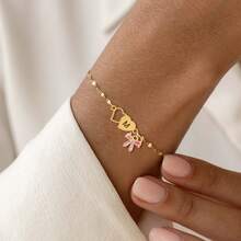 1件新款不锈钢双心字母蝴蝶结手链，女士金色唇链手链 - 金黃色 - 查看 1