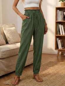 Quần nữ màu xanh lá cây có dây rút ở eo và túi, kiểu dáng rộng rãi thoải mái. - xanh quân đội - Xem 2