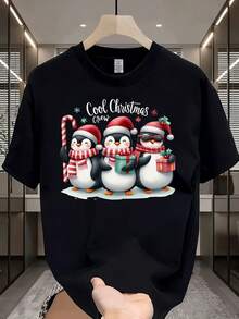 Camiseta de Hombre con Patrón de Pingüino y Bastón de Caramelo de Navidad - Camiseta Ligera, Transpirable y Resistente a las Arrugas con Cuello Redondo y Caja de Regalo, Estampado de Acebo, Adecuada para Todas las Estaciones, Atuendo Casual para Fiestas - Negro - Ver 1