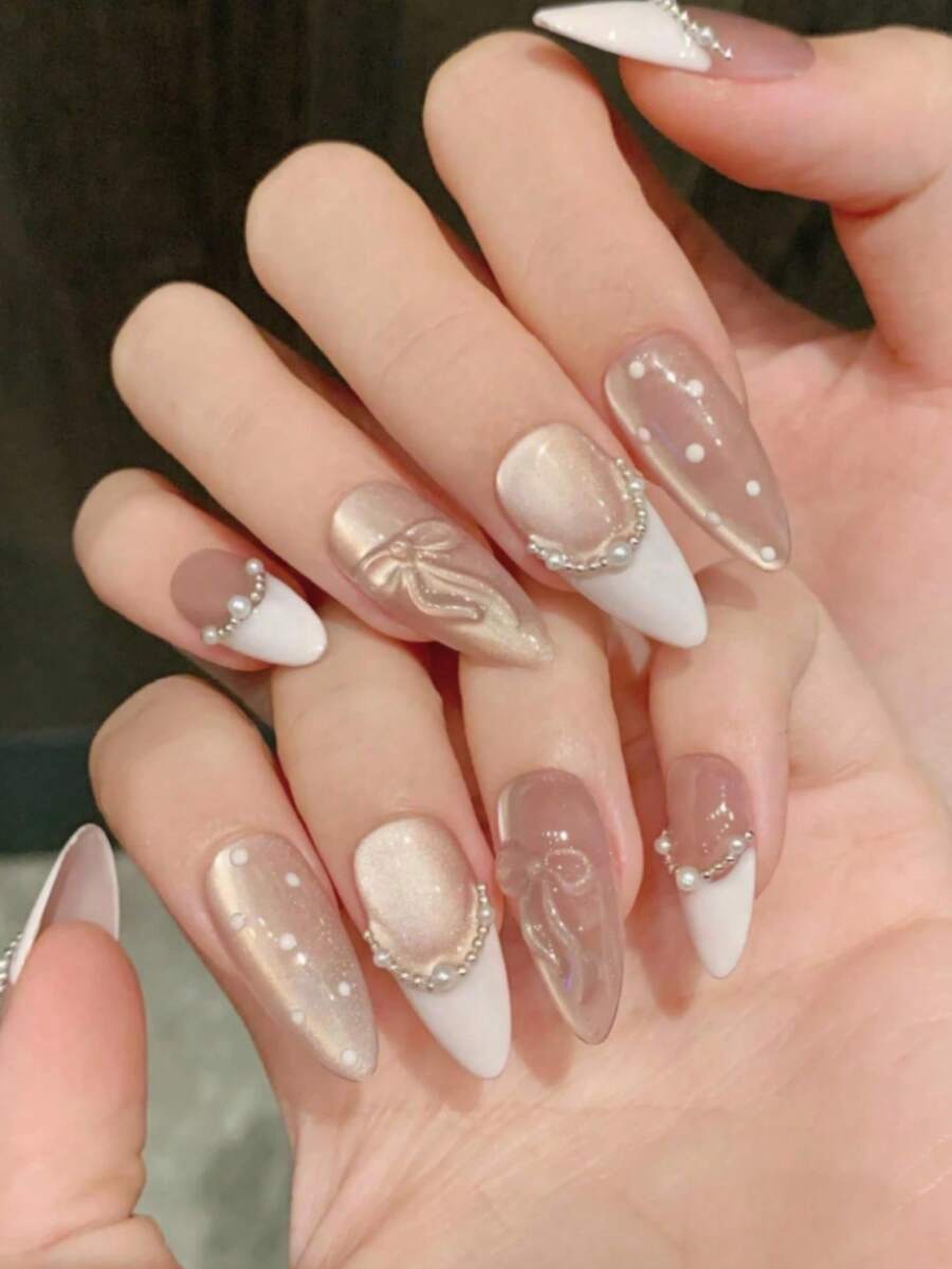 10片中长杏仁形美甲贴片 - 2025新款手工柔粉色法式美甲 | 闪亮猫眼效果，搭配精致珍珠链和蝴蝶结装饰 | 可重复使用，甜美风格 | 附赠果冻胶和指甲锉，适合日常佩戴、约会和派对 - 淺粉色 - 查看 1