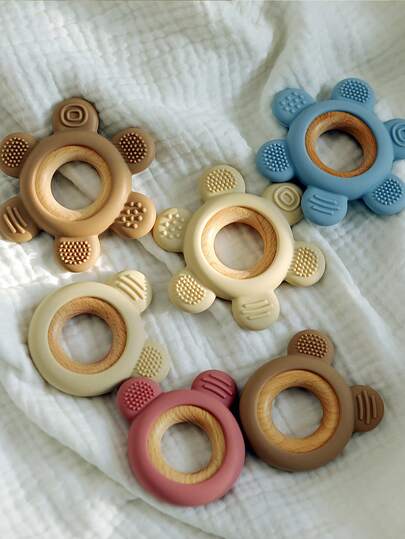 1个婴儿硅胶木环牙胶，适合婴幼儿磨牙，小熊和花朵造型，多种颜色可选，柔软舒适，婴儿用品