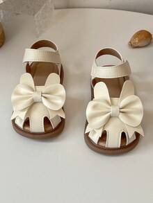 2026 New Girls Bowknot Hollow Out Decor Soft Non-Slip Wear-Resistant Open Toe Lace-Up Flat Sandals, Suitable For Summer Picnics, Daily Outings And School Activities - Beige - View 3