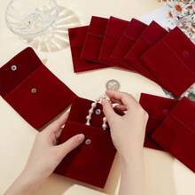 10个双面绒布按扣袋，尺寸2.76*2.76*0.95英寸，小巧礼品袋，适用于珠宝收纳，可装戒指、项链、耳环、手镯、钥匙等，是节日、婚礼、订婚的理想之选。 - 紅色 - 查看 8