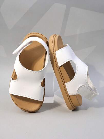 1双女童简约清新风凉鞋 - 纯白镂空设计！柔软合成革材质，经久耐穿，舒适防滑，露趾低帮，宽鞋带+可调节后跟带，厚实平底。日常玩耍和夏季公园郊游的理想之选！