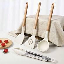 一套硅胶木柄厨房用具，包括不粘硅胶铲、汤勺、防滑食物夹、耐热不锈钢牛排夹、烧烤夹和隔热煎铲。 - 彩色 - 查看 10