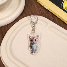 1个可爱猫咪表情包悲伤哭泣小猫头亚克力钥匙扣/包包挂饰/挂绳，非常适合送给男朋友、女朋友、家人，也可作为派对礼物、动物主题手机装饰等等。