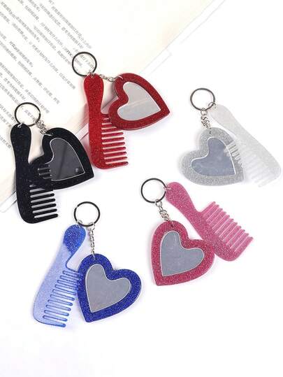 这款心形化妆镜钥匙扣，饰有闪亮粉末和亮片，男女皆宜，可用作车钥匙扣、钥匙圈或礼物。佩戴舒适，是日常休闲装扮的理想配饰。它还可以用作吊坠、手机链、汽车饰品、钥匙扣或包包装饰。是送给女友、家人、老师、参加聚会和生日的完美礼物之选。