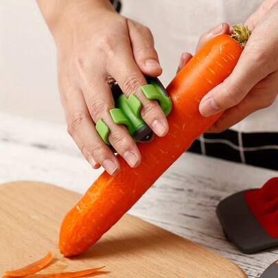 1pc Vegetable Peeler Tool, Comfortable Grip, Non-Slip Rubber Ring Design. Made Of Stainless Steel And Durable Thermoplastic Rubber, Non-Conductive, Suitable For Carrots, Pumpkins And Other Ingredients, Meets Food Contact Safety Standards. Creative Stainless Steel Finger Peeler, Multi-Functional Fruit Peeler, Suitable As Christmas, Holiday, Birthday, New Year Small Gift
