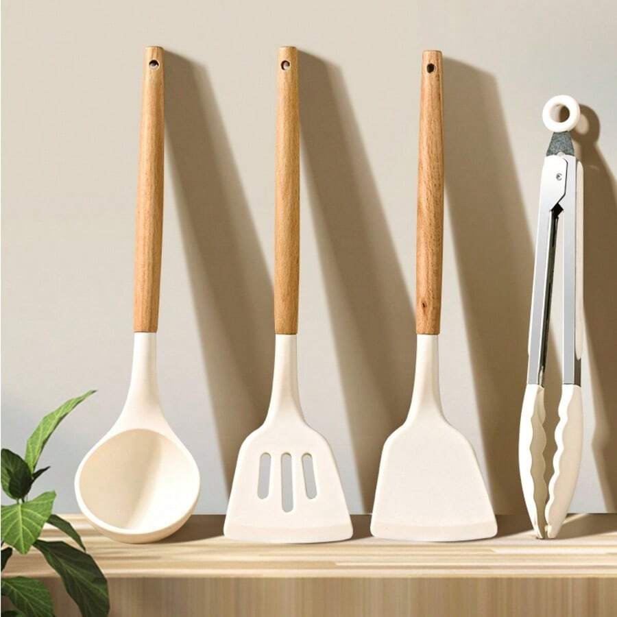 一套硅胶木柄厨房用具，包括不粘硅胶铲、汤勺、防滑食物夹、耐热不锈钢牛排夹、烧烤夹和隔热煎铲。 - 彩色 - 查看 1