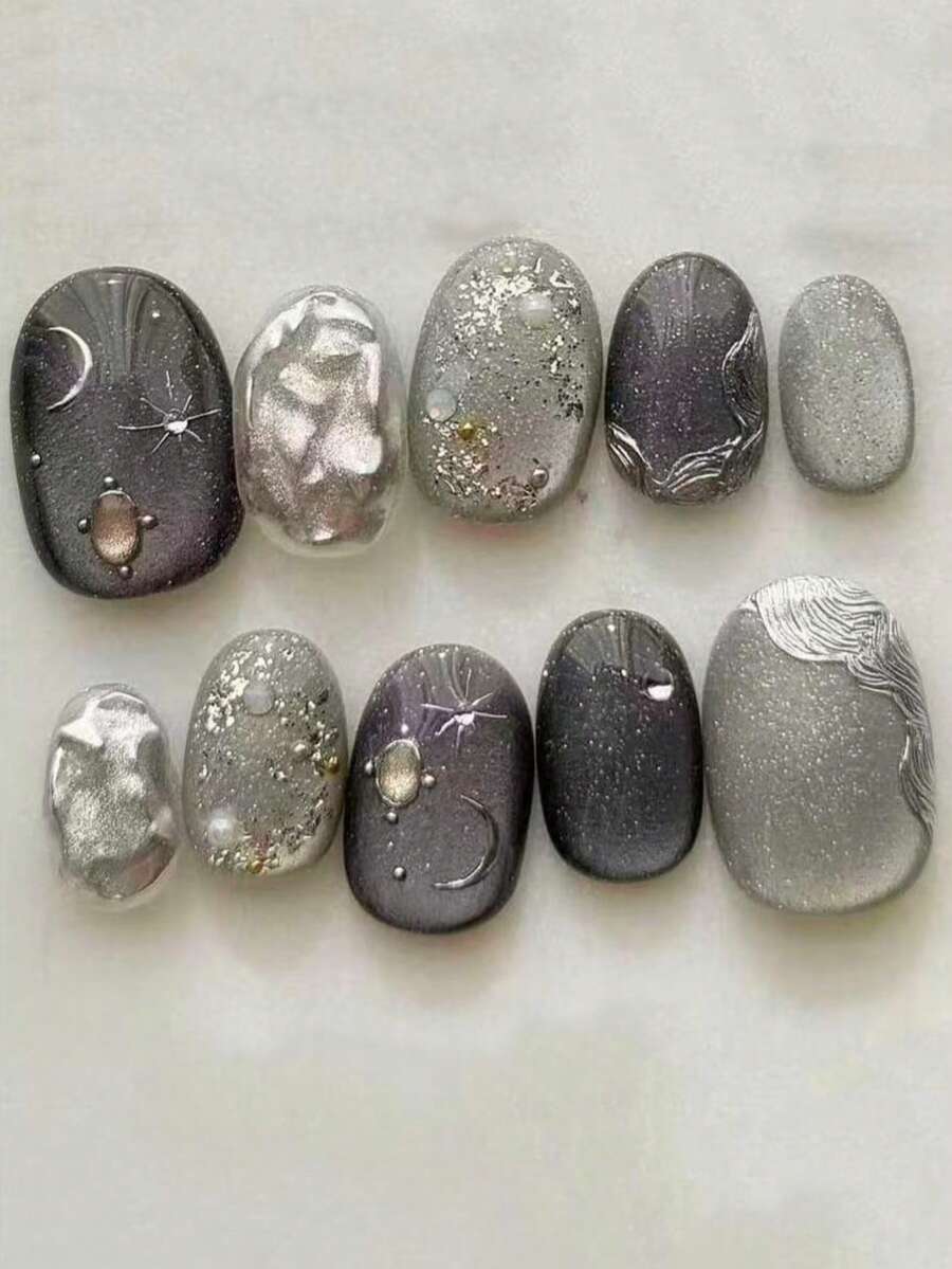 10片/套 椭圆形灰色猫眼图案手工美甲贴纸，饰以星月图案，优雅精致。银色点缀更添亮点！整体风格成熟时尚，易于搭配各种服饰。适合派对、约会和日常佩戴。美甲用品