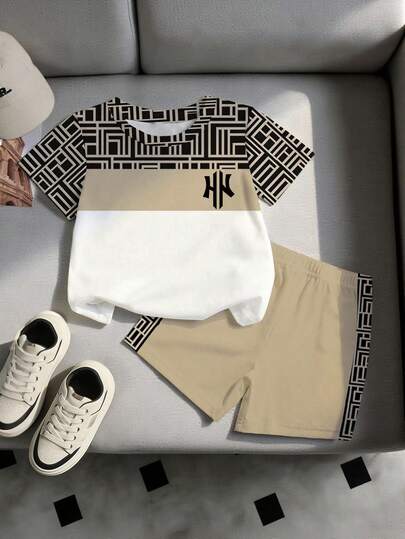Bộ áo thun ngắn tay và quần short họa tiết hình học ghép mảnh dành cho bé trai.
