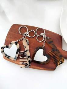 这款心形化妆镜钥匙扣，饰有闪亮粉末和亮片，男女皆宜，可用作车钥匙扣、钥匙圈或礼物。佩戴舒适，是日常休闲装扮的理想配饰。它还可以用作吊坠、手机链、汽车饰品、钥匙扣或包包装饰。是送给女友、家人、老师、参加聚会和生日的完美礼物之选。 - 彩色 - 查看 5