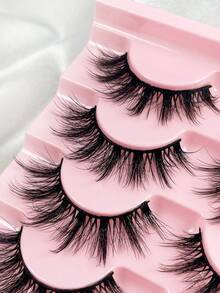 7 pares de pestañas postizas 3D con efecto voluminoso y puntiagudo, de mink sintético, de aspecto natural, reutilizables, de 15 mm, con efecto de ojos de gato cruzados, para usar en casa o en movimiento - Pestañas largas - Ver 4