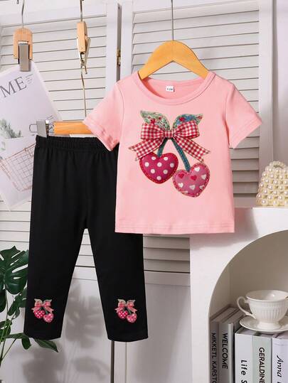 女婴休闲爱心蝴蝶结印花短袖上衣和印花长裤套装，春夏款