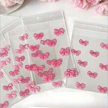 100个粉色蝴蝶结自粘袋照片卡片拉链袋包装卡片礼品袋透明可爱OPP袋返校、毕业、派对、婚礼、生日、伴娘生日、包装、透明、小尺寸、婚礼派对回礼、生日派对、纪念品、新娘礼物、单身派对用品、礼品包装 - 淺粉色 - 查看 2