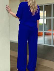 2 pezzi/set Completo casual da donna, composto da top a maniche corte a girocollo in tinta unita e pantaloni lunghi con tasche in vita, elegante per l'estate - Blu - Visualizzare 11
