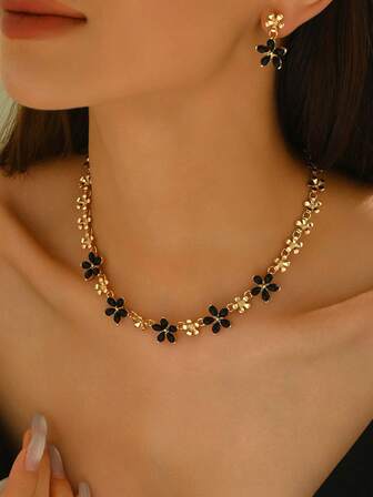 1 Set de joyería de moda minimalista y versátil con colgante y aretes de acrílio negro con incrustaciones geométricas 3D y florales en forma de gota de agua para mujeres