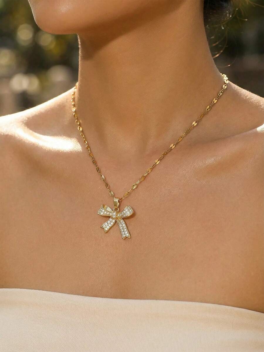 1 Stück süße, modische, exquisite, elegante Kupfer- und Zirkonia-Schleife Anhänger, Gold- und Silber-Edelstahl Halskette für Frauen, Party- und Straßen-Schmuck für den täglichen Gebrauch