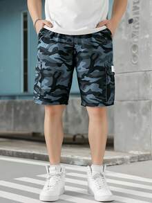 男童春夏迷彩短裤，经典迷彩图案，尽显酷炫青春气息，多口袋设计方便收纳小物件，兼具街头潮流风格，宽松版型适合春夏各种活动，舒适时尚，日常穿着或轻度运动皆宜。 - 彩色 - 查看 5
