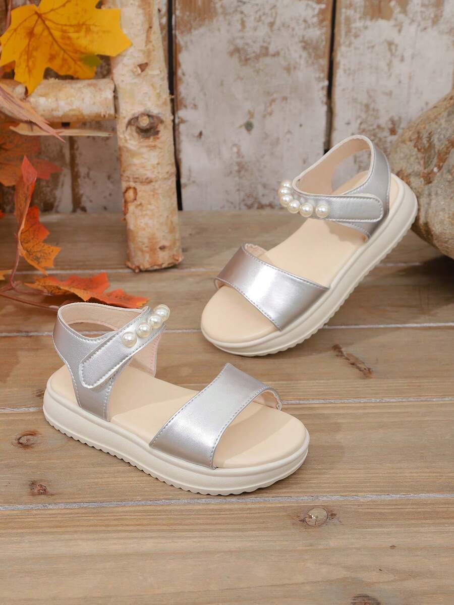 A Pair Of The Latest Silver Pearlescent Faux Pearl Strap Hook And Loop Sandals For Children In Summer - A Comfortable Style, An Excellent Choice For Daily Outings, Shopping In Malls, And Summer Vacations. - Silver - View 1