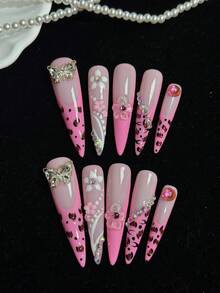 10 件手工制作的盔甲套装，按压式美甲，甜美酷炫的混搭风格，以甜美的粉色为主色调，融入深棕色豹纹元素，并点缀以水晶蝴蝶、立体花朵和渐变色水钻，平衡了少女与野性的气质。 - 彩色 - 查看 2