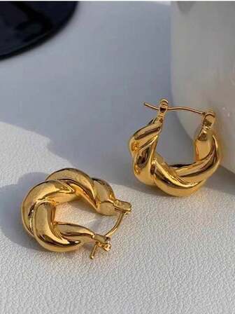 1 par de pendientes de moda minimalistas con diseño geométrico retorcido, adecuados para el uso diario de las mujeres