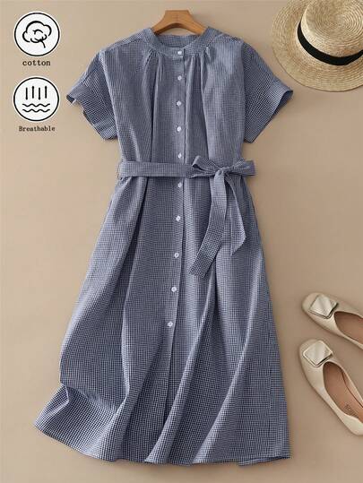 优雅复古女士格纹中长连衣裙，立领短袖，纽扣和系带细节