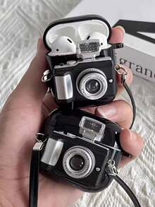 1个创意卡通黑色相机TPU保护壳，兼容苹果1/2/3蓝牙耳机