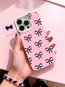 A Phone Case With An Irregular Black Bow Pattern On A Pink Background. It's A Sweet Yet Cool Full-Coverage Protective Case, Compatible With IPhone 17 Pro Max/17 Pro/17/16 Pro Max/16 Pro/16/15 Pro Max/15 Pro/15/14 Pro Max/14 Pro/14/13 Pro Max/13 Pro/13/12 Pro Max/12 Pro/12/11. It's A Shockproof Soft Case.