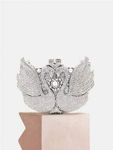 Clutch de luxo em formato de cisne, prateada com cristais, para ocasiões especiais. Bolsa de mão com strass em formato de animal, ideal para casamentos e festas de noiva. Mini bolsa feminina prateada e rosa com strass, perfeita para bailes e festas. Acompanha caixa de presente requintada. - Prata - Ver 1