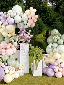 124件套粉绿色、紫色和粉色气球拱门套装，包含粉绿色、紫色、粉色、黄色和薰衣草色气球，非常适合生日、性别揭晓派对、新娘送礼会、花卉仙境主题派对、婴儿派对、婚礼和野花主题派对装饰。 - 彩色 - 查看 2