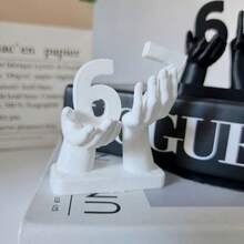 1pc Creative Hand Holding Number 67 Statue Ornament | Unique Hand-Shaped Design | Holding And Displaying The Number 67 | Home Office Decor, Suitable For Christmas, New Year, Thanksgiving | Perfect Gift