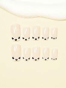 用24片中号方形按压式假指甲升级你的造型！时尚简约，情人节可爱黑色法式图案，白色法式按压式假指甲，经典日常白色法式裸色底按压式假指甲，全覆盖假指甲套装，适合女性和女孩。套装包含1张粘合贴片和1个迷你指甲锉，果冻胶条，随机发货。 - 黑與白 - 查看 4