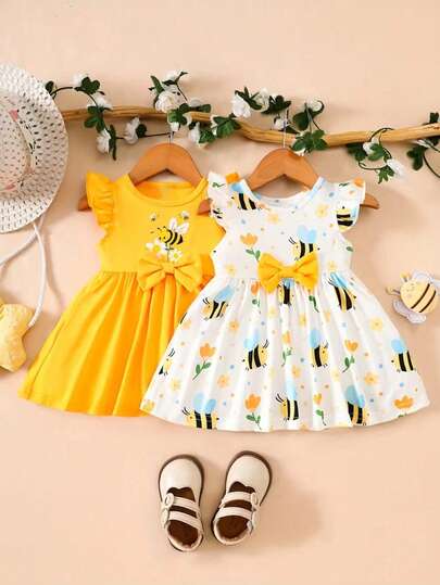 Bộ 2 chiếc váy in hình ong dễ thương cho bé gái, tay áo hình bướm, thích hợp mặc ngoài trời và mùa hè.