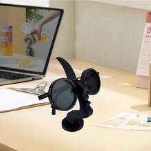 优雅侧装式眼镜架，简约黑色设计，时尚桌面或床头收纳方案，是节日、圣诞节、新年礼物的理想之选，也是桌面配件、时尚眼镜架的理想之选，采用塑料材质，可作为桌面眼镜架或桌面收纳架使用。 - 彩色 - 查看 10