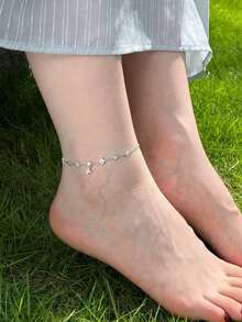 1pc Women's Fashionable Shiny Four-Leaf Flower Anklet, Waterproof Stainless Steel Chain With Copper Flower Pendant, Suitable For Daily Wear, Parties, Beach