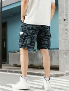 男童春夏迷彩短裤，经典迷彩图案，尽显酷炫青春气息，多口袋设计方便收纳小物件，兼具街头潮流风格，宽松版型适合春夏各种活动，舒适时尚，日常穿着或轻度运动皆宜。 - 彩色 - 查看 8