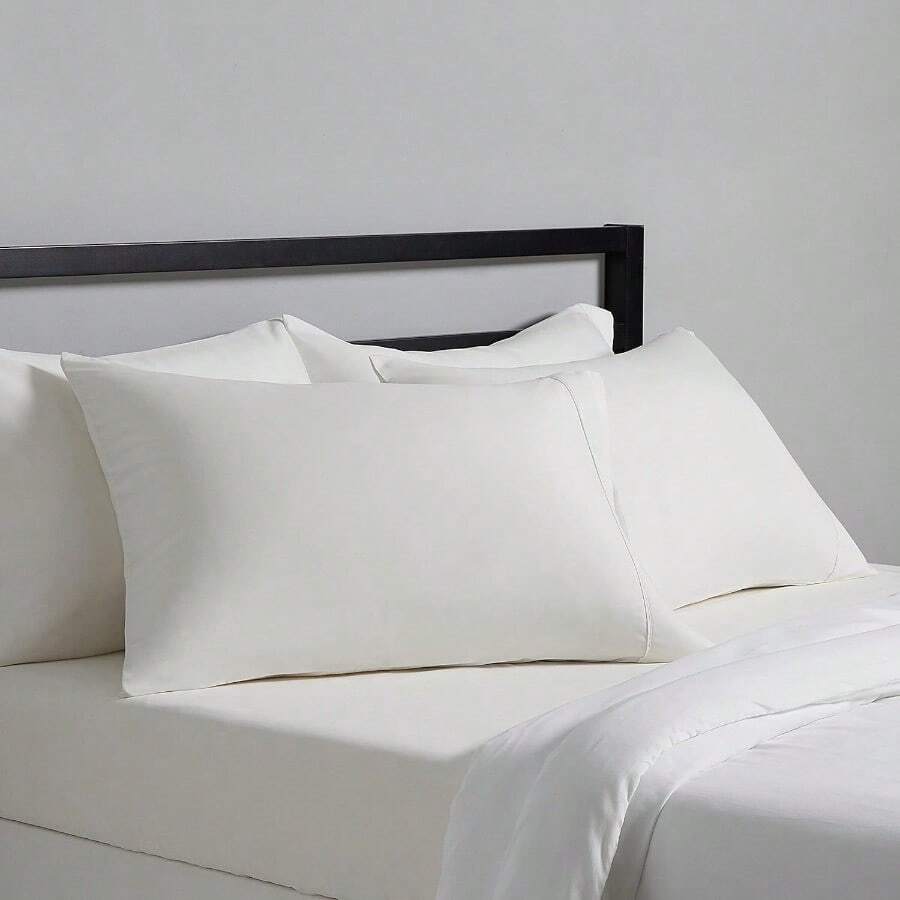 Basics - Funda de Almohada de Microfibra Ligera Supersuave de Fácil Cuidado Estándar Crema Paquete de 2 76 cm de Largo X 50 cm de Ancho Almohadas No Incluidas - Crema - Ver 1