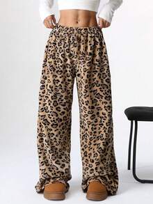 Calça feminina casual de inverno com estampa de leopardo felpuda e cintura elástica, ideal para o outono e inverno. Pernas largas e modelagem solta. Perfeita para usar no outono e inverno.