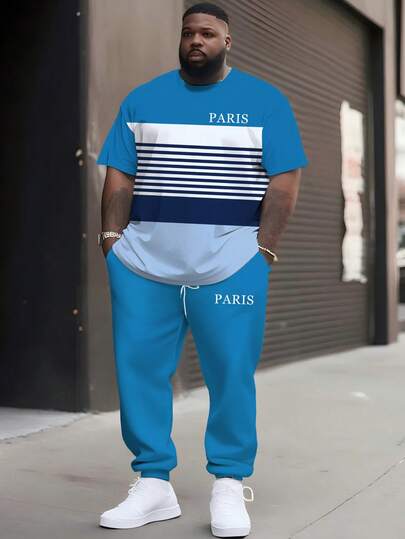 Bộ đồ nam cỡ lớn độc quyền màu xanh hồ sọc chữ "PARIS" gồm áo tay ngắn và quần ống rộng có dây rút, kiểu dáng rộng rãi, tôn dáng, đơn giản, thường ngày. Áo cổ tròn và quần ống rộng có dây rút.