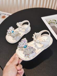 1双新款时尚彩色撞色蝴蝶结可爱休闲平底凉鞋，适合女婴和幼儿