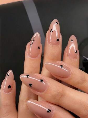 24 piezas de puntas de uñas con forma de almendra, diseño simple de corazón negro con letras, uñas postizas acrílicas de longitud media en color rosa nude y patrón de corazón negro. Uñas acrílicas, adecuadas para citas, bailes y uso diario de mujeres. ¡Perfecto como regalo para tu novia en el Día de San Valentín!