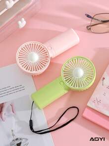 AOYI 1pc Solid Color Handheld Mini Fan, Battery Powered Portable With Lanyard, 1-Speed Natural Wind, Quick Cooling, Unisex For Office/Dorm/Outdoor/Beach/Pool Party, Minimalist Stylish Design, Instant Cooling Companion (Requires 2 AAA Batteries) - Multicolor - View 5