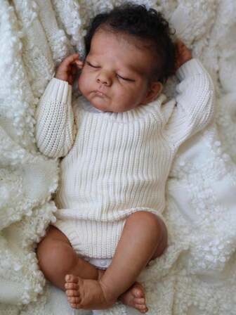 50 cm reborn docka i sovande tillstånd, svartbrun hud, vinyllemmar, tygkropp, 20 tums realistisk babydocka, söt födelsedagspresent, badleksak