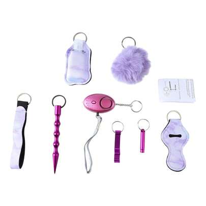 Juego de 9 llaveros con alarma fuerte y silbato de cuero sintético para mujer, color morado