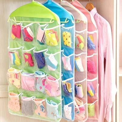 1 túi đựng đồ treo cửa trong suốt 16 ngăn, dùng để đựng giày dép và phụ kiện, dễ mang theo, làm từ chất liệu khác.