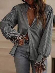 Áo sơ mi nữ ôm dáng mùa xuân và thu này có thiết kế họa tiết da báo, với chất liệu vải thoải mái. Thích hợp cho việc đi làm hàng ngày và những buổi đi chơi thường ngày. Một chiếc áo sơ mi nữ thanh lịch, một chiếc áo dài tay nữ phối họa tiết da báo, một chiếc áo sơ mi kẻ sọc nữ quyến rũ. - Đen và trắng - Xem 4